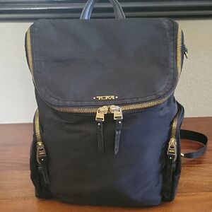 Tumi Black Backpack with Gold Accents